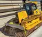 Bouteur John Deere jaune 110 CH