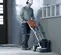 Rectifieuse à béton à conducteur accompagnant HUSQVARNA argent, orange et noire, une tête, électrique