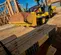 Chargeuse d’aménagement paysager John Deere jaune et noire