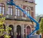 Orange and beige JLG telescopic boom lift