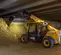 Yellow JCB electric variable reach forklift