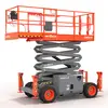 Side view of a retracted orange Skyjack scissor lift with safety rails.