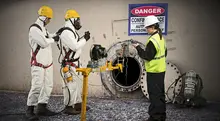 three people with scba masks 