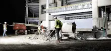 Light stand providing light on construction site