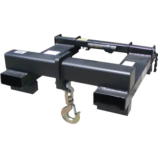 Top view of a black crane hook attachment block with a silver hook.