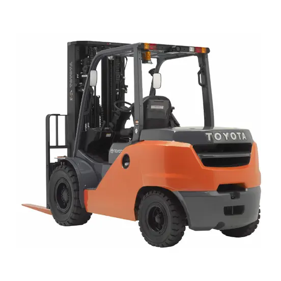 Rear angled view of orange and black Toyota warehouse forklift with black lifting mast and orange forks with an open cabin.