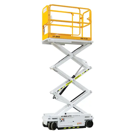 Side view of yellow and white scissor lift in a partially extended position with safety rails and compact base.